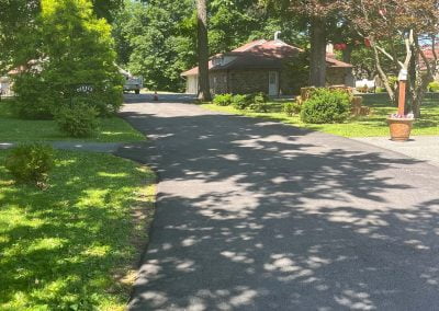 Newly paved asphalt road in a neighborhood - Five Star Asphalt Paving | PA