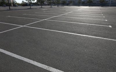 Why Parking Lot Paving and Striping Matter for Your Business (And How to Do It Right!)
